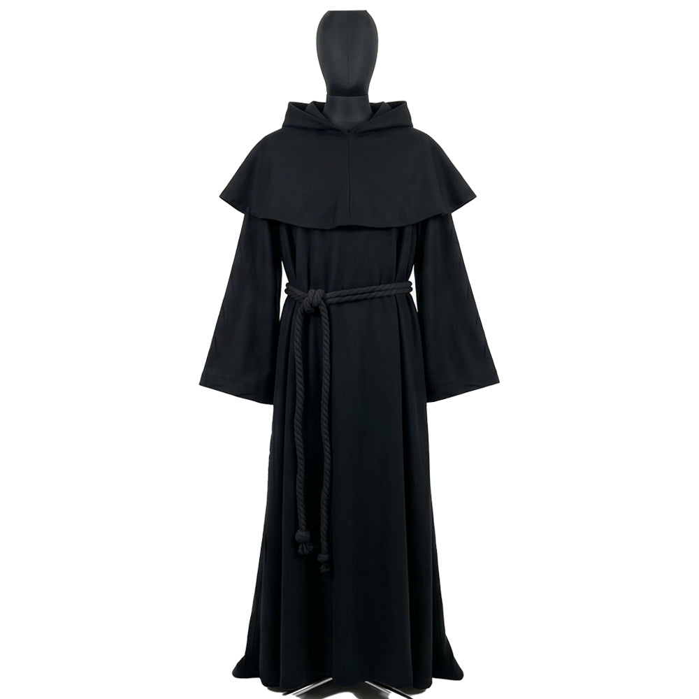 Front view of a black monk habit on a display form, showing the pointed capelet and rope cincture at the waist.
