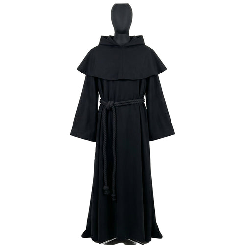 Front view of a black monk habit on a display form, showing the pointed capelet and rope cincture at the waist.