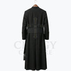 Back view of the black cassock robe, showing the sash carried straight across the waist and the plain full-length skirt.