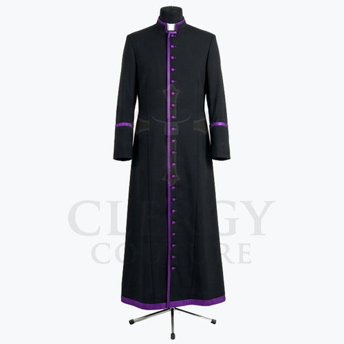 Front view of a black clergy cassock robe with a full-length purple button placket and purple piping at the collar.