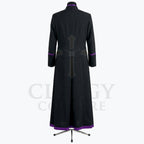 Angled front view of the black cassock robe showing the purple cuff band and the purple band at the hem.