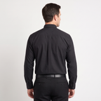 Back view of the black clergy shirt showing the shoulder yoke and centre pleat.