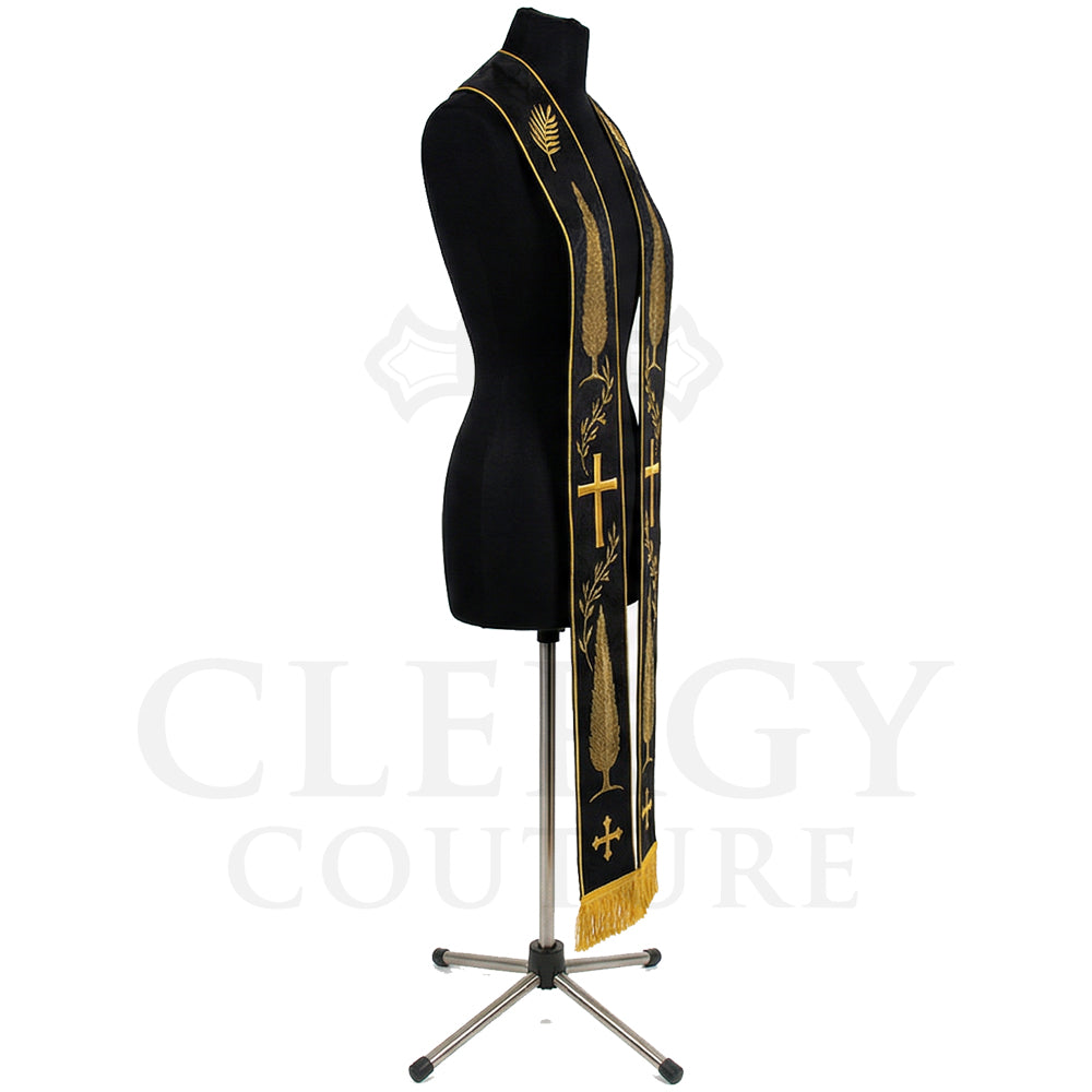 Close side view of the black funeral stole showing the gold cypress tree, cross and leaf embroidery in detail
