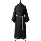 Front view of a plain black hooded monk habit on a display form, cinched with a tan rope cincture.