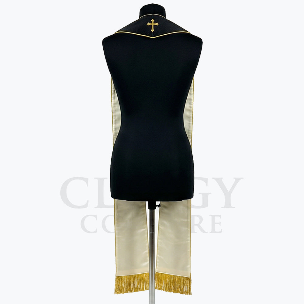 Back view of the black Passion Stole on a mannequin, showing the cream-toned reverse and gold cross at the yoke.