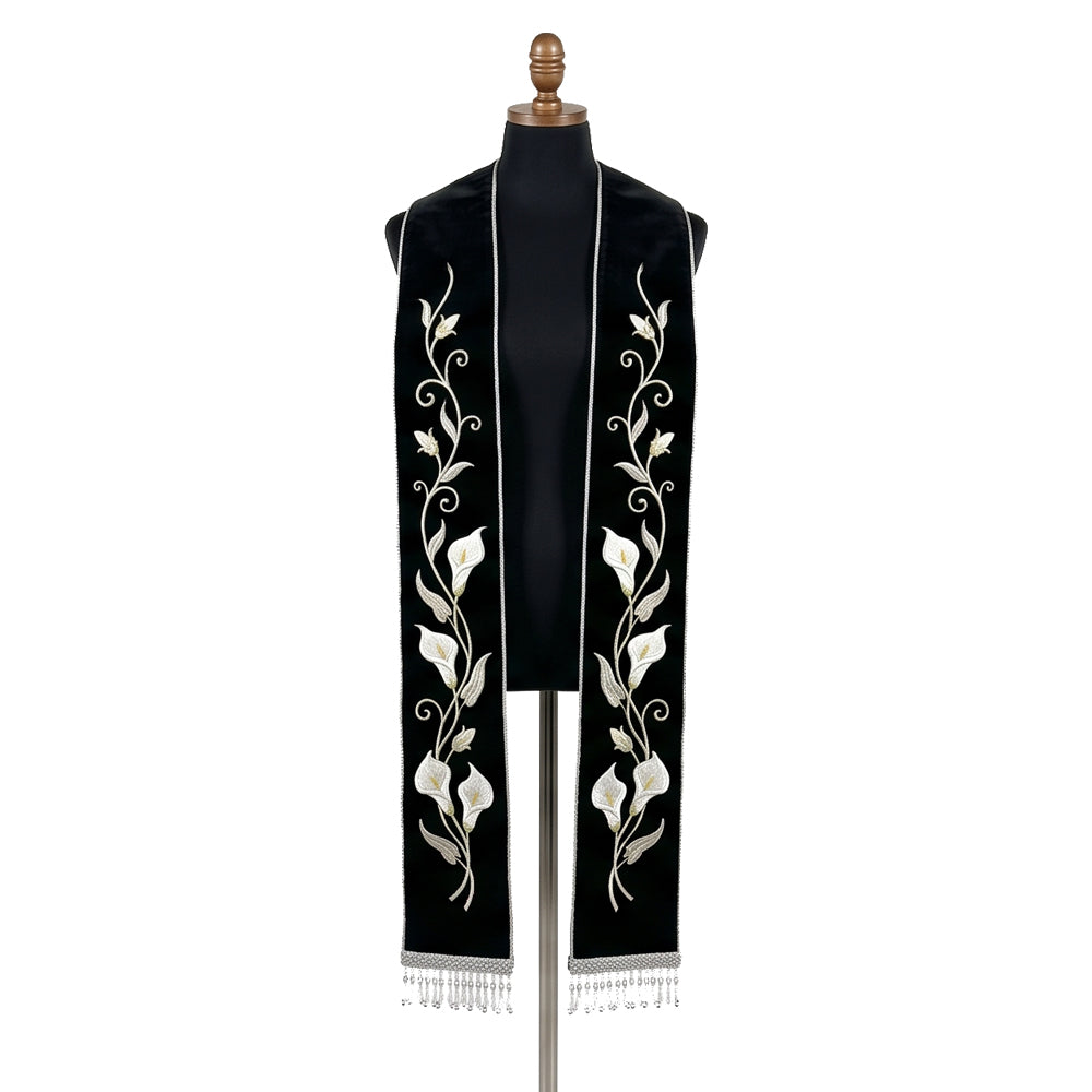 Black velvet-look stole with a white calla lily vine embroidered down both panels above silver beaded fringe