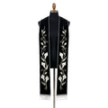 Black velvet-look stole with a white calla lily vine embroidered down both panels above silver beaded fringe
