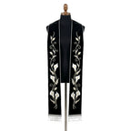 Black velvet-look stole with a white calla lily vine embroidered down both panels above silver beaded fringe