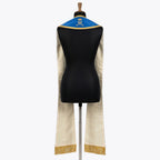 Back view of the blue Marian stole with a gold crowned AM monogram on the yoke above an ivory-toned drape
