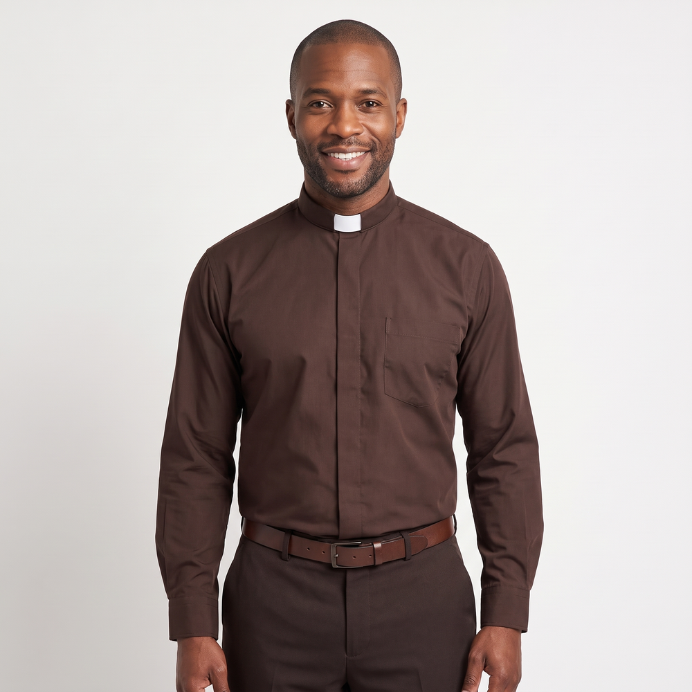Man wearing the brown long-sleeve tab-collar clergy shirt with a white tab (shown for styling, not included), covered placket and left chest pocket, against a light grey background.