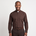 Man wearing the brown long-sleeve tab-collar clergy shirt with a white tab (shown for styling, not included), covered placket and left chest pocket, against a light grey background.