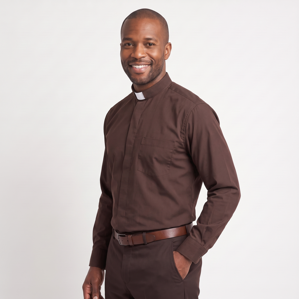 Three-quarter view of the brown clergy shirt showing the collar profile, sleeve and cuff.