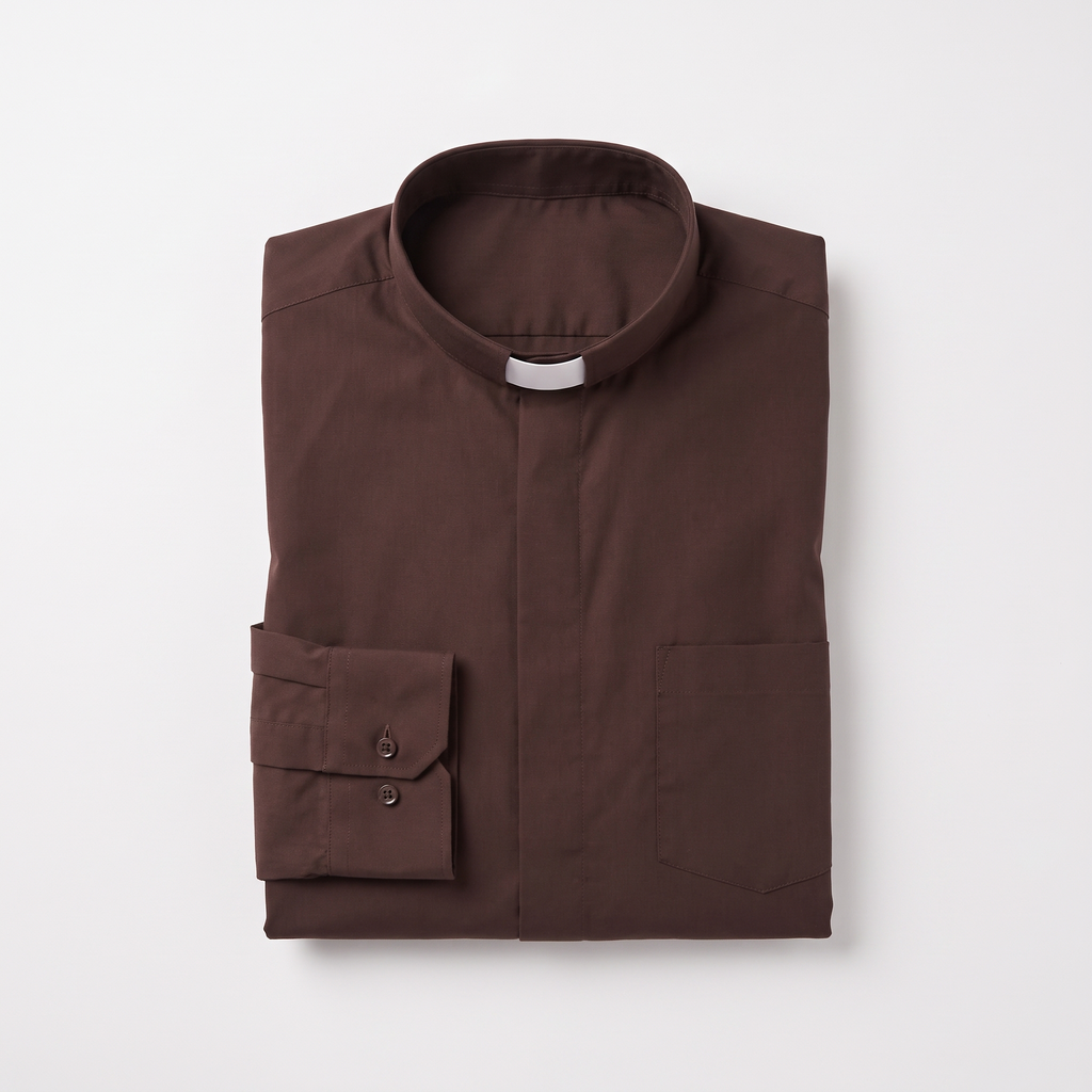 The brown long-sleeve clergy shirt folded, with the collar standing and a buttoned barrel cuff visible.