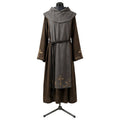 Front view of a brown monk habit with a grey scapular embroidered in gold cross and leaf motifs.