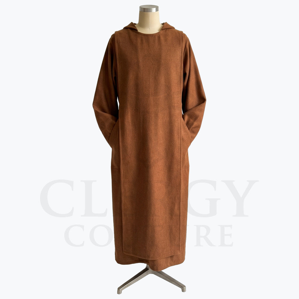 Front view of a brown monk habit with a hood and patch pocket at each hip on a cream display form.