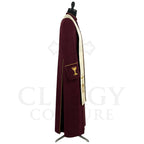 Side view of the burgundy cassock robe showing the flapped hip pocket marked with a gold chalice.