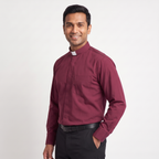Three-quarter view of the burgundy clergy shirt showing the collar profile, sleeve and cuff.