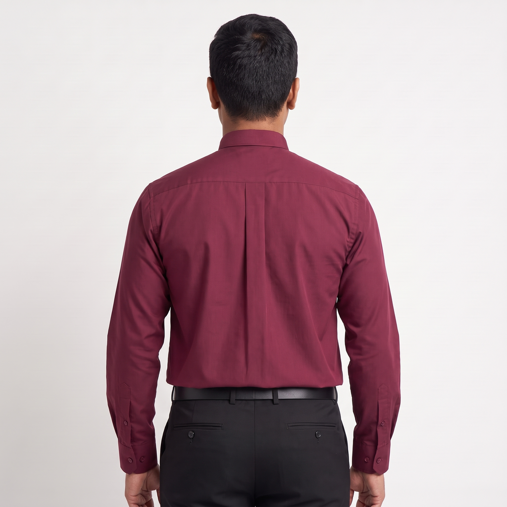 Back view of the burgundy clergy shirt showing the shoulder yoke and centre pleat.