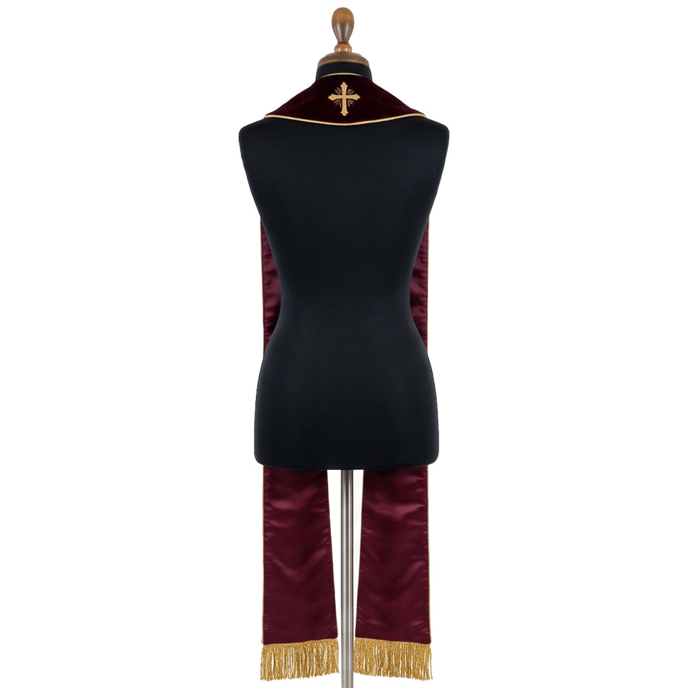 Back view of the burgundy velvet-look stole with a single gold cross on the yoke above plain satin-look fabric