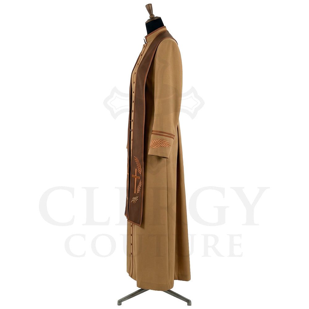 Side view of the camel cassock robe showing the brown yoke, the cuff bands and the flapped hip pocket.