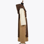 Side profile of the camel habit showing the tasselled rope cincture and the layered scapular hem