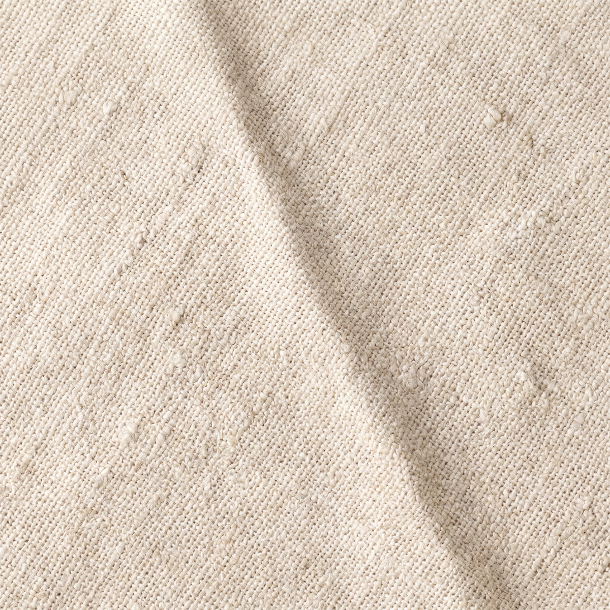 Natural undyed linen with an irregular slubby plain weave