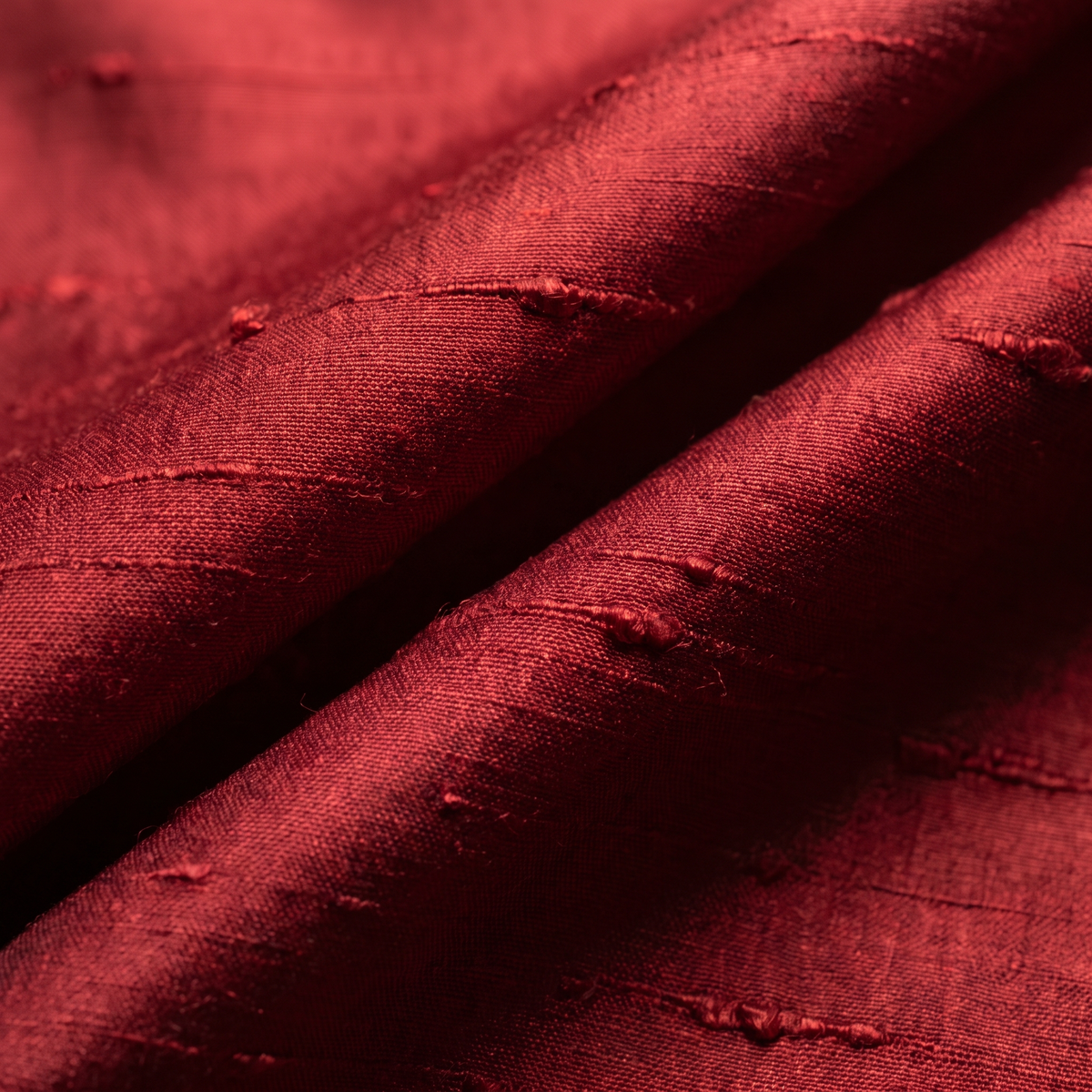 Cardinal red silk dupion with visible slubs and a soft lustre