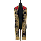 Roman-style priest stole on a mannequin, red yoke and navy velvet-look bands with gold scrollwork and crosses.
