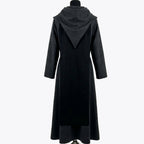 Back view of the charcoal monk habit showing princess seaming and the flared stepped hem