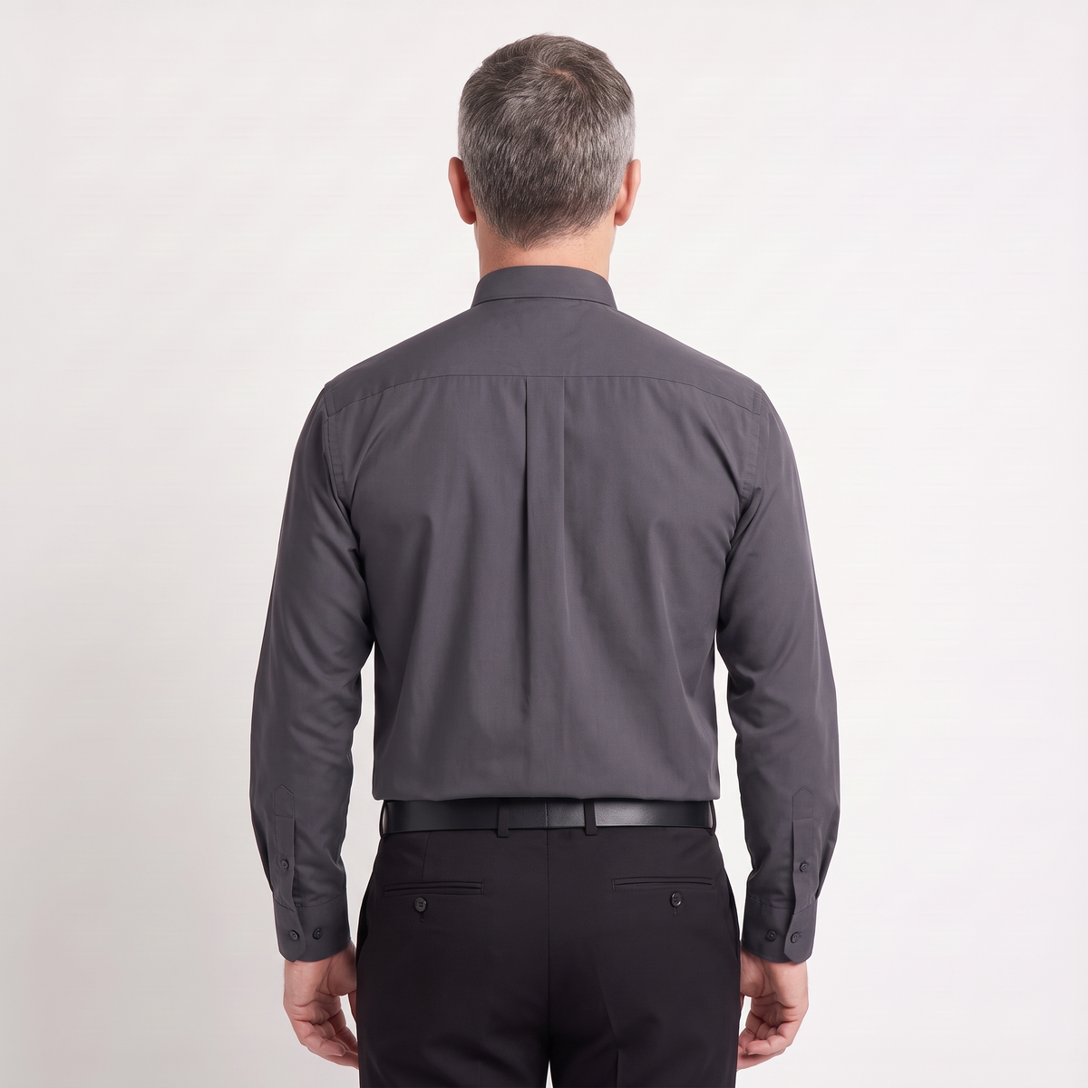 Back view of the charcoal clergy shirt showing the shoulder yoke and centre pleat.