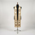 Ivory priest stole on a mannequin, gold Chi Rho medallion, wreath, Alpha and Omega and crown on both panels.