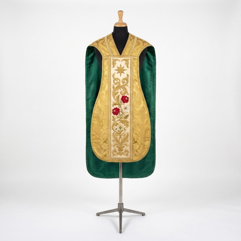 Front of a gold damask fiddleback chasuble with an ivory column embroidered with a star, red roses and a white lily, and green lining showing at the sides