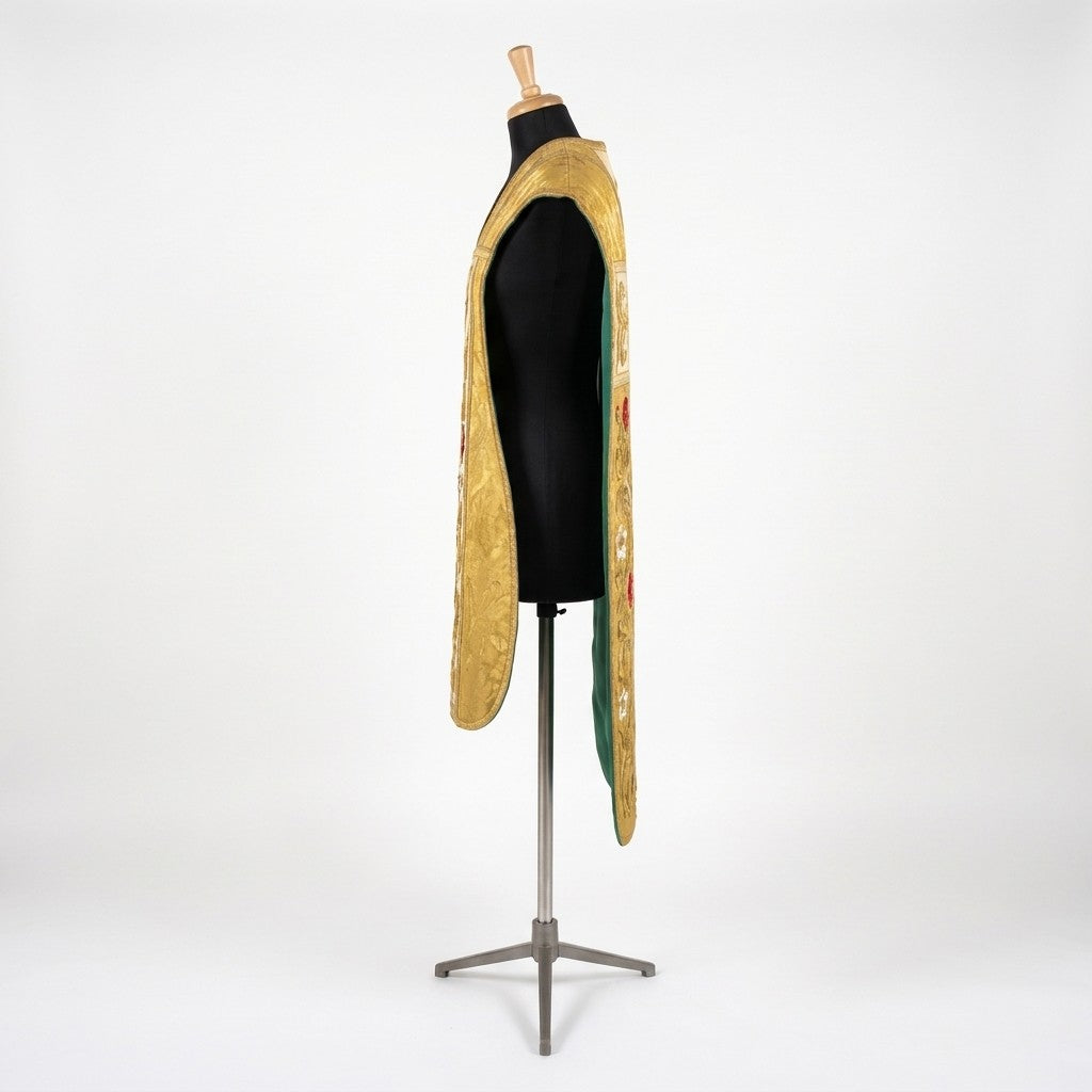 Side view of the gold fiddleback chasuble showing the open Roman cut and green lining