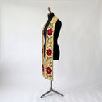 Close-up of the Gold Poinsettia Christmas Stole showing the raised velvet-textured petal detail