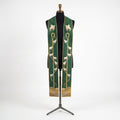 Front view of the Good Shepherd Stole with an embroidered crook, sheep trail and hillside scene