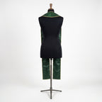Back view of the Good Shepherd Stole showing plain green satin with gold edge piping at the seam