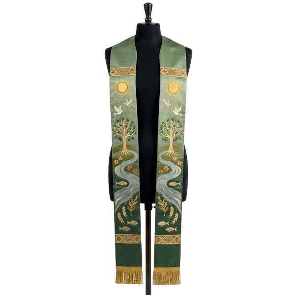 Green ombre stole on a mannequin, gold tree of life, river with fish and doves on both panels.
