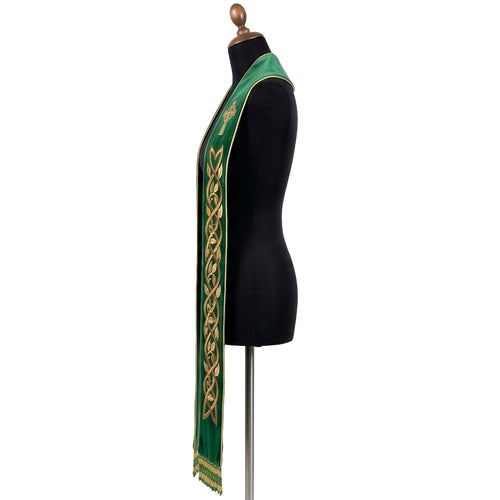 Side profile of the green velvet-look Celtic Cross Stole showing the gold-and-green beaded fringe