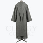 Back view of the grey monk habit showing the scapular's triangular point and hood seam