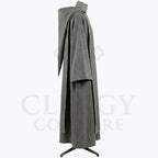 Side profile of the grey monk habit showing the tonal scapular layered over the tunic beneath