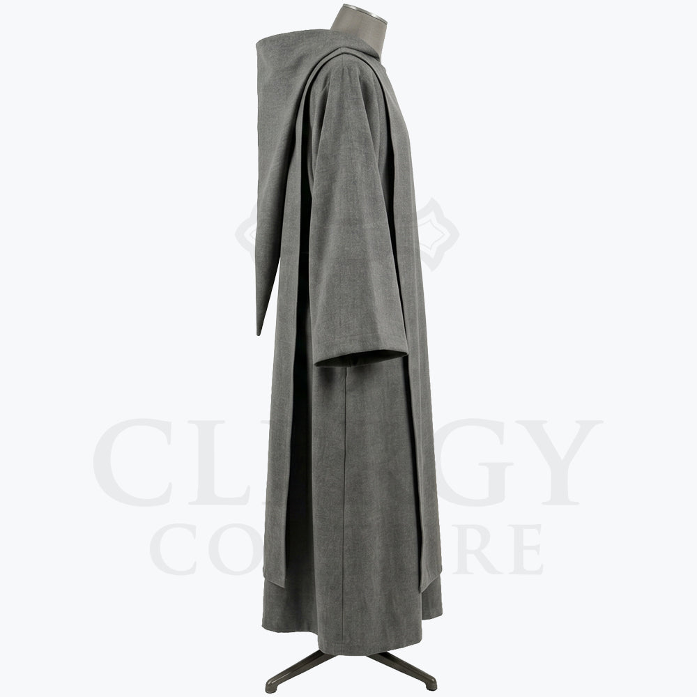 Side profile of the grey monk habit showing the tonal scapular layered over the tunic beneath