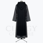 Back view of the grey monk habit showing the black scapular repeated as a back panel