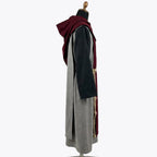 Side profile of the grey monk habit showing the pellegrina collar draping over the shoulder