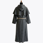 Back view of the grey habit showing the unbroken skirt beneath the wide cowl collar.