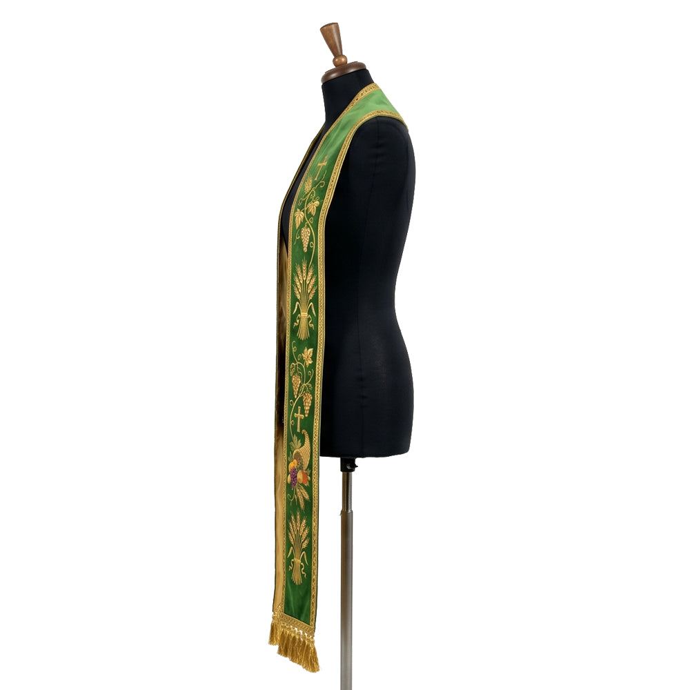 Close-up of gold grapevine, wheat sheaf and cornucopia embroidery on the Harvest Stole's green velvet-look panel.