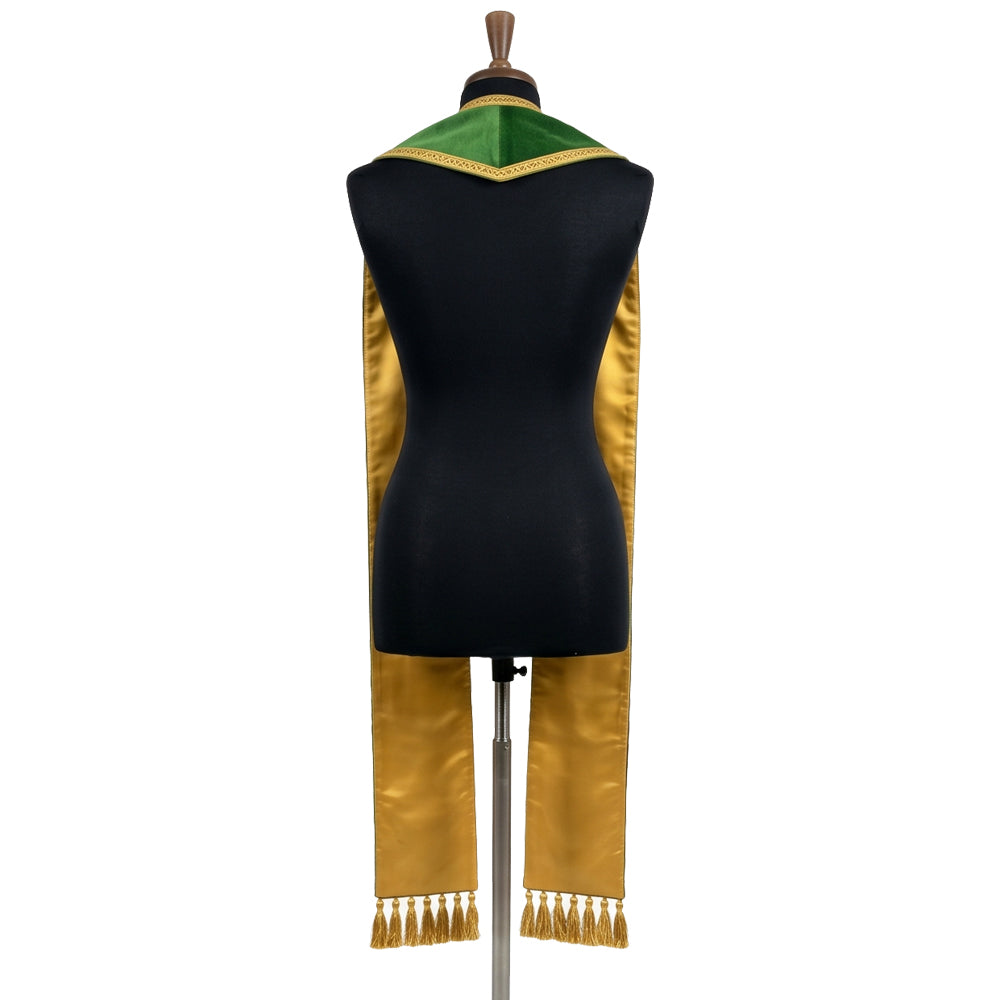 Reverse view of the Harvest Stole on a mannequin, showing the plain gold satin-look lining and gold tassel fringe.