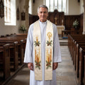 Priest wearing an ivory satin-faced Advent stole embroidered with lit candles and pine sprays down both panels