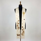 Front view of the Ivory Damask Nativity Stole, showing the gold Star of Bethlehem, scattered stars and lily embroidery.