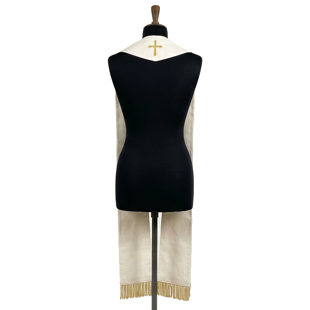 Back neck of the ivory and gold stole, showing a small gold cross centred above gold beaded fringe at the hem.
