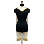 Back neck of the ivory and gold priest stole, showing the plain flap with its gold chevron trim border.